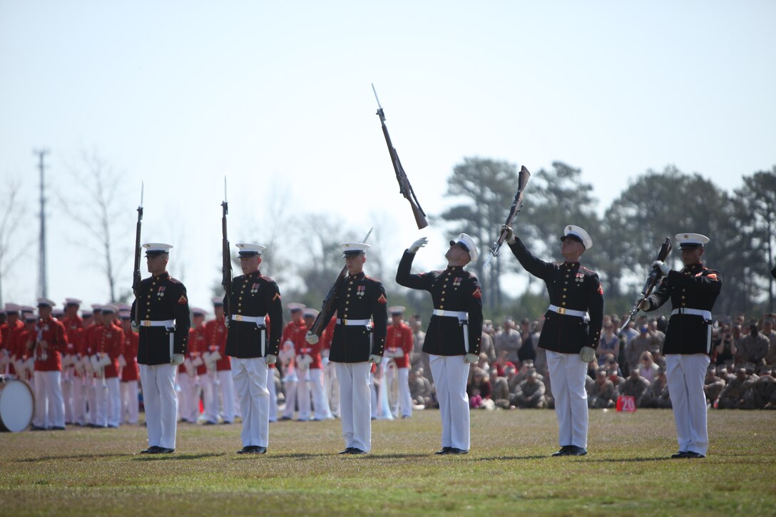 The Marine Corps Silent Drill Platoon provided quiet entertainment to Marines and their families through their swift drill movements during their stop at Marine Corps Base Camp Lejeune's W.P.T. Hill Field, March 14. It was the final performance of their 2012 National Installations Tour.