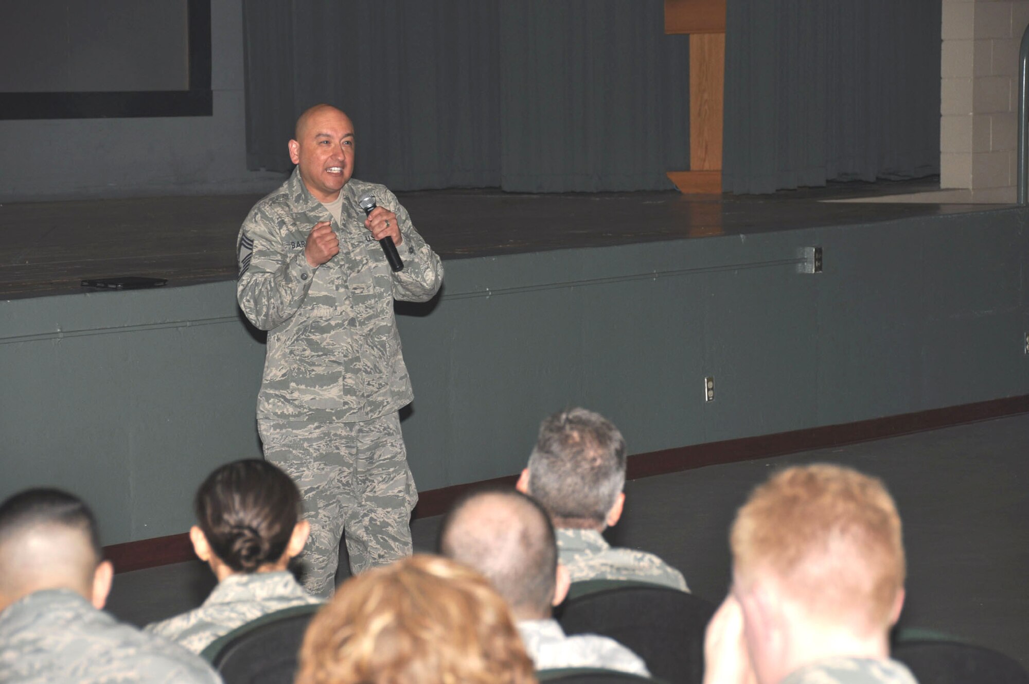 Chief Master Sgt. Jose Barraza, 570th Contingency Response Group  makes a point as he speaks at the 349th Air Mobility Wing A flight Commander's Call Mar. 4. (U.S. Air Force photo/Tech. Sgt. Rachel Martinez)