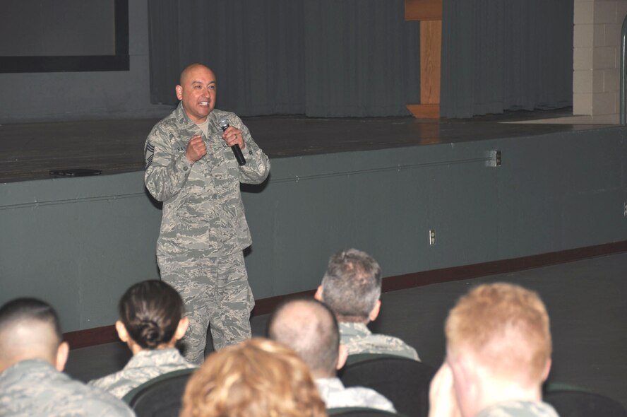Chief Master Sgt. Jose Barraza, 570th Contingency Response Group  makes a point as he speaks at the 349th Air Mobility Wing A flight Commander's Call Mar. 4. (U.S. Air Force photo/Tech. Sgt. Rachel Martinez)