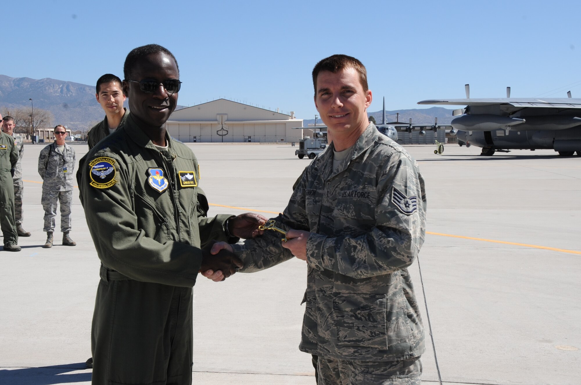 Gen. Rice turns over the aircraft “key” to Staff Sgt. Gordon Grgurich, 58th Aircraft Maintenance Squadron.

Photo by Dennis Carlson
