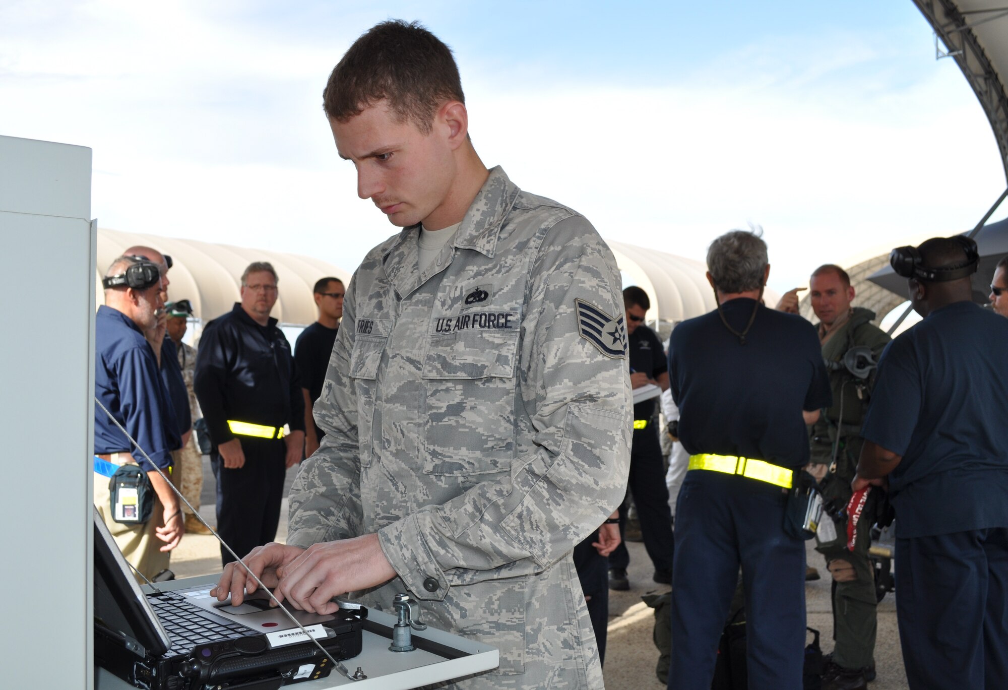 EGLIN AIR FORCE BASE, Fla. -- Staff Sgt. Andrew Fries, 33rd Aircraft Maintenance Squadron crew chief, Eglin Air Force Base Fla., reviews tasks in the Autonomic Logistics Information System to perform the post-flight inspection after an F-35A Lightning II sortie March 13. The F-35 completed about an hour and a half orientation and was the second sortie to date. Although the first F-35 launch March 7 was successful, it was cut short after 20 minutes because of a fluid leak. The F-35 Integrated Training Center at Eglin AFB has an initial goal of two sorties a week, and plans to steadily increase. (U.S. Air Force photo/Maj. Karen Roganov)