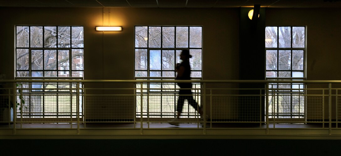 Tech. Sgt. Bobbie Lynn Sherman, 375th Air Mobility Wing Legal Office NCOIC, runs 10 warm-up laps for the Pregnancy and Post-partum fitness class at the Fitness Center. The class, offered by the Health and Wellness Center every Wednesday at 3 p.m., offers aerobics and strength training to new moms in an adjustable manner to meet each woman’s individual needs. (U.S. Air Force photo by Staff Sgt. Stephenie Wade) 