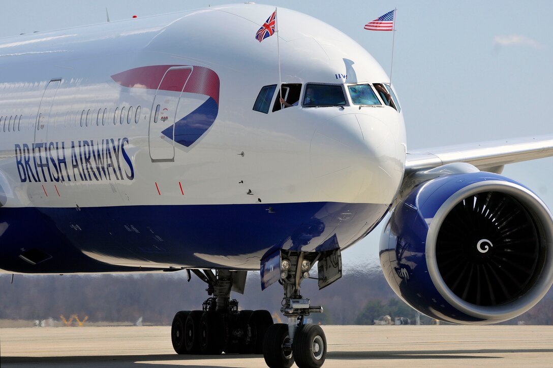 An aircraft carrying British Prime Minister David Cameron taxis down the runway on Joint Base Andrews, Md., flight March 13. During his visit, the prime minister met with the president to discuss boosting economic growth, Iran, Afghanistan and Syria. (U.S. Air Force photo/Senior Airman Perry Aston)