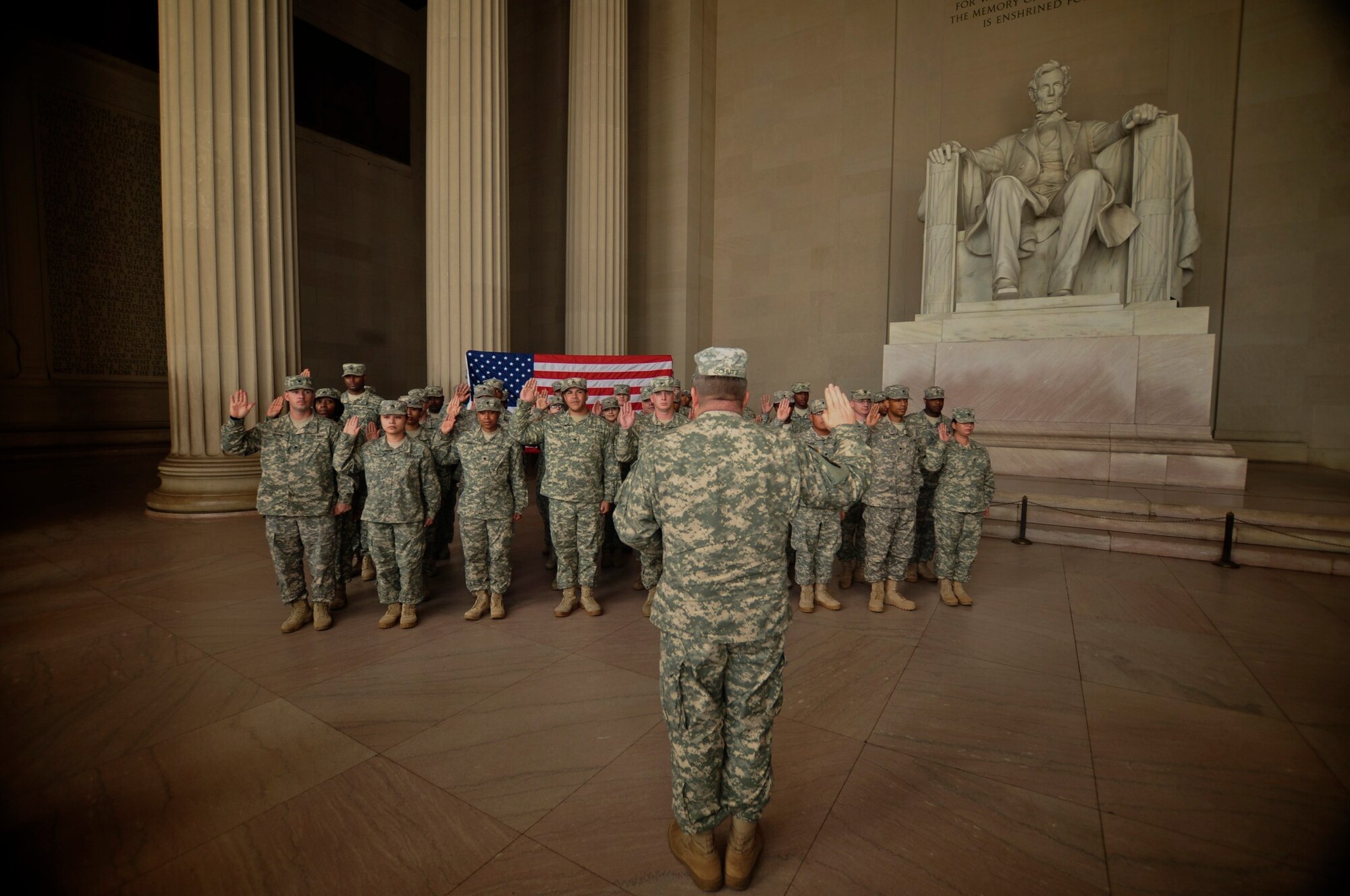 Soldiers of the 7th Sustainment Brigade's Special Troops Battalion reenlist at the Lincoln Memorial in Washington D.C. recently. There were 36 Soldiers from Fort Eustis, Va., who took part in the unique ceremony in our nation’s capitol. (U.S. Army photo by Staff Sgt. Jason Lassiter/Released)