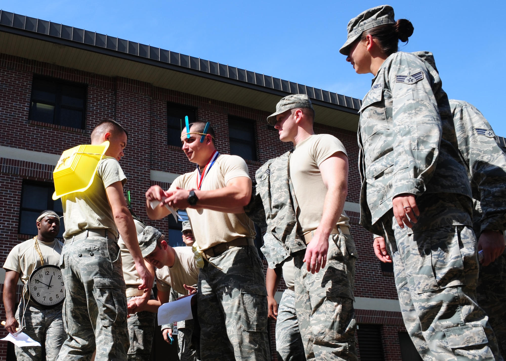 Airman Leadership School students participate in the Nwoknu tribe exercise at Joint Base Charleston - Air Base Mar. 2. The exercise demonstrates the importance of effective communication and possible communication barriers that relate to global diversity and regional awareness that can occur while on a deployment. (U.S. Air Force photo/Staff Sgt. Katie Gieratz) 
