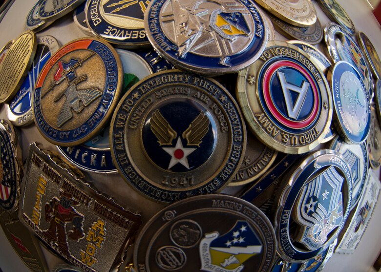 HOLLOMAN AIR FORCE BASE, N.M. -- Challenge coins have various purposes throughout the Air Force and various meanings to its Airmen. Some view it as a memento of significant value and others see it as just a collectible and everything in between.