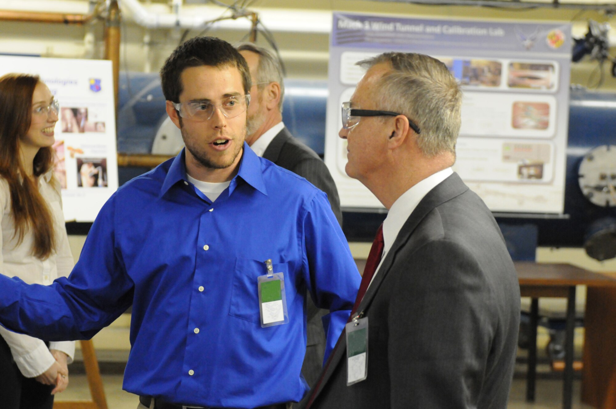 Kevin Ryan, a University of Maryland student, explains important aspects of his research to Edward Greer, TRMC program manager for test, evaluation, science and technology, at the Jan. 31 Centers of Testing Excellence (COTE) pilot program kickoff at the Hypervelocity Tunnel 9 facility in Silver Spring, Md. (Photo provided)