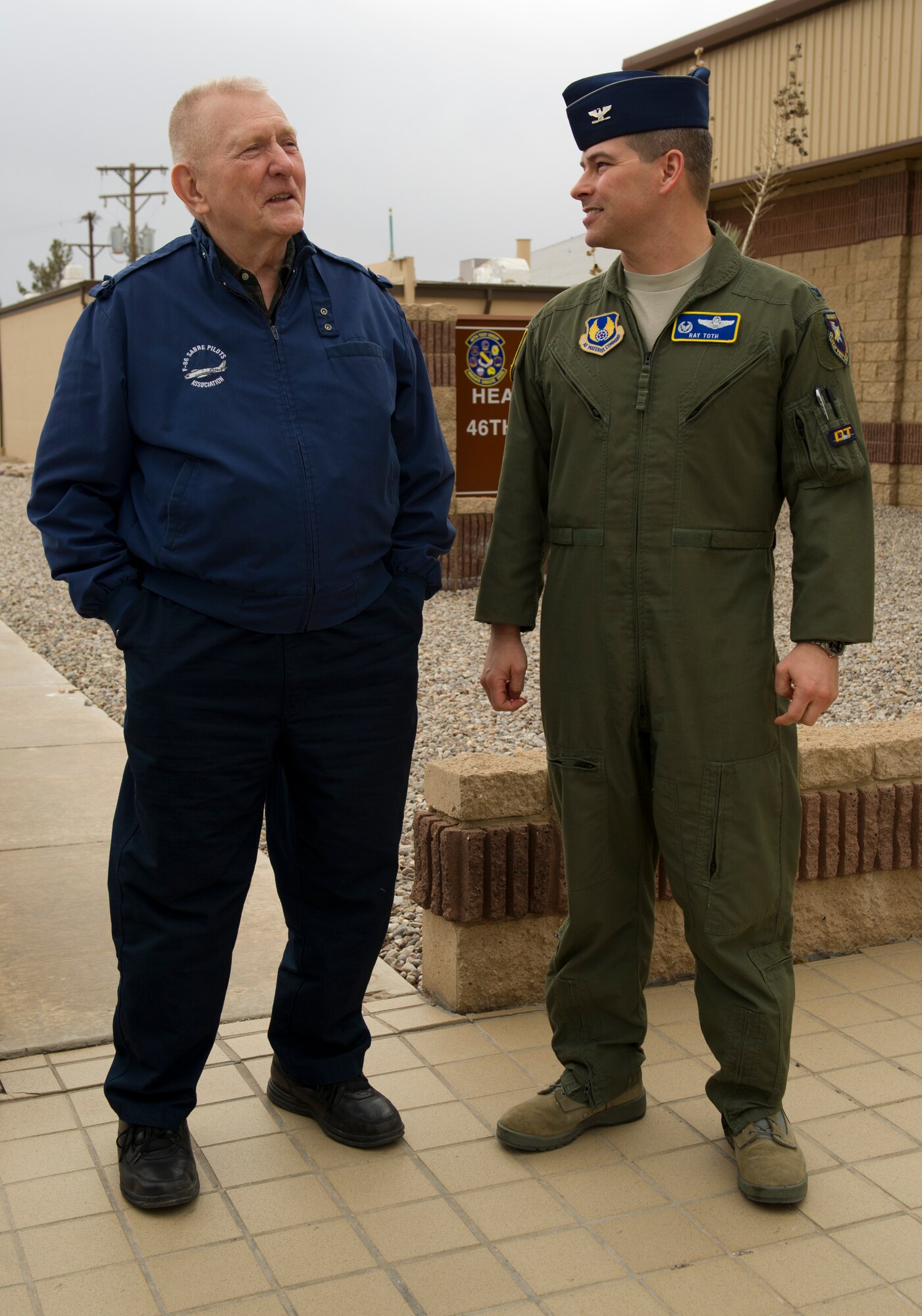 HOLLOMAN AIR FORCE BASE, N.M. – Mr. Gene Kranz, flight director of the odd-numbered Apollo missions, meets Col. Ray Toth, 46th Test Group commander, March 8. In the past Kranz worked at Holloman AFB with the McDonnell Aircraft Corporation, where he assisted with the research and testing of new Surface-to-Air and Air-to-Ground missiles. (U.S. Air Force photo by Airman 1st Class Michael Shoemaker/Released)