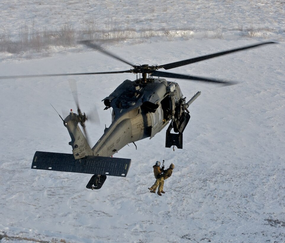Alaska Air National Guard crews practicing hoist maneuver. Photo by MSgt Sean Mitchell.
