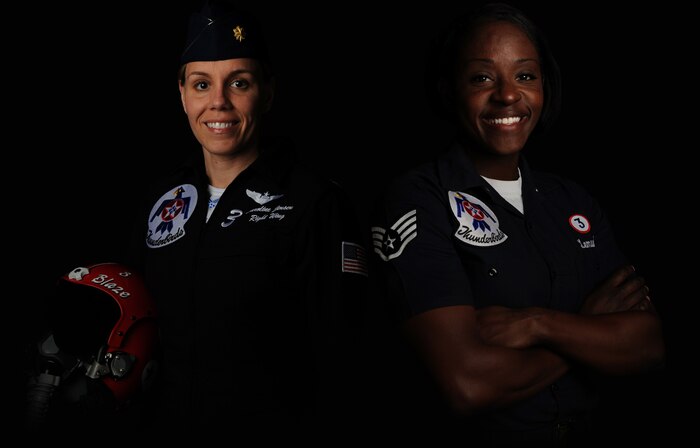 Maj. Caroline Jensen, Thunderbird 3, Right Wing pilot and her dedicated crew chief, Staff Sgt. Tacota LeMuel pose for a portrait at the Thunderbird hangar, Nellis Air Force Base, Nev., March 2, 2012. Maj. Jensen is the Thunderbirds' first female reservist demonstration pilot. Sgt. LeMuel is one of two female crew chiefs assigned to the Thunderbirds and the only female dedicated crew chief on this year's showline.
(U.S. Air Force photo/Staff Sgt. Larry E. Reid Jr., Released)