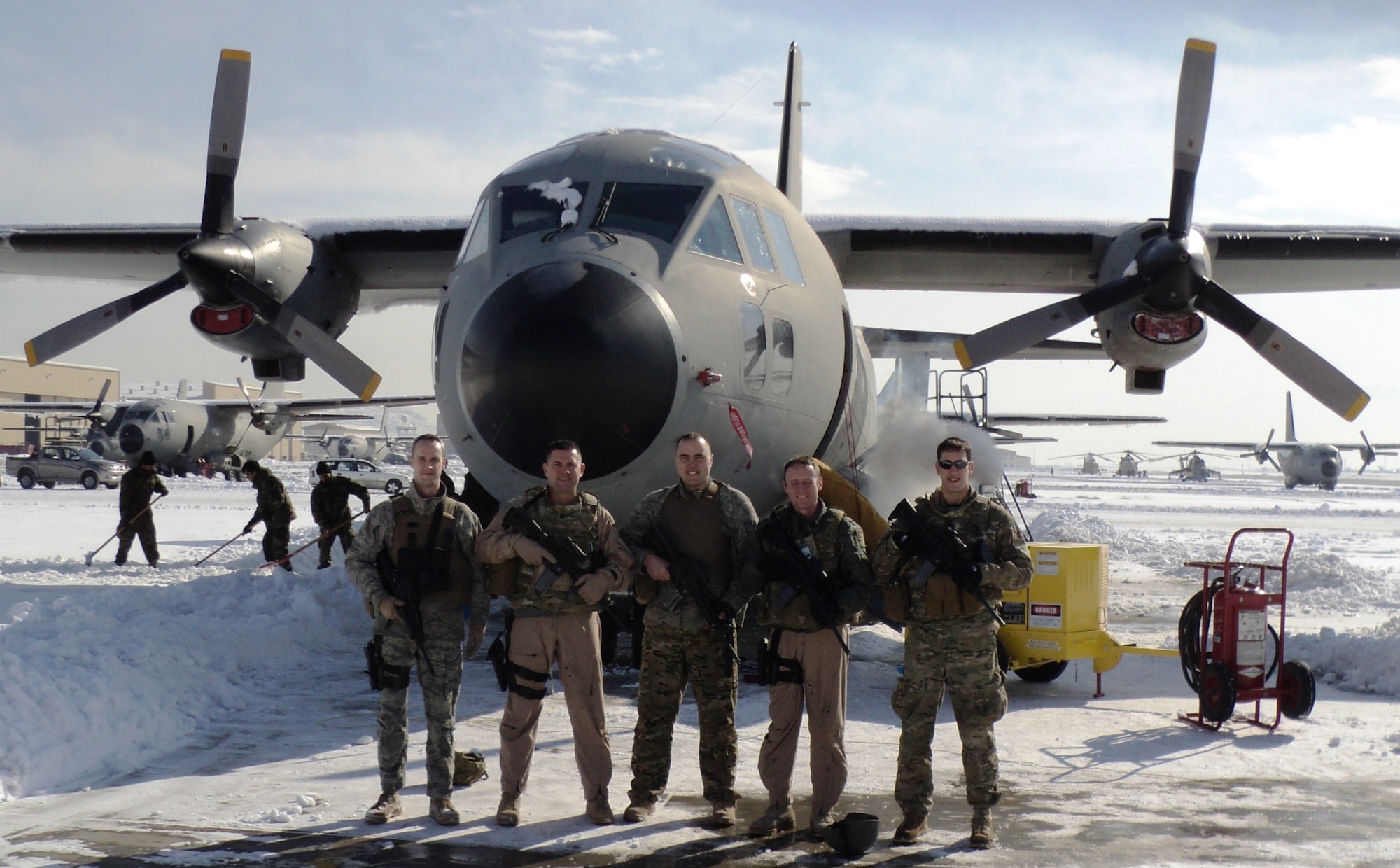 From left to right Capt. Matt Bruckner, from the 87th Flying Training Squadron, Lt. Col. David Waller, from the 84th FTS, Maj. Allen Smith, from the 86 FTS, Capt. Jeff Primus, from the 85th FTS, and Capt. Dom Camponovo, from the 85th FTS pose for a photo after recently meeting up while deployed to Kabul, Afghanistan. The Laughlin pilot’s work as air advisors to an Afghan C-27 airlift squadron. (Courtesy photo)