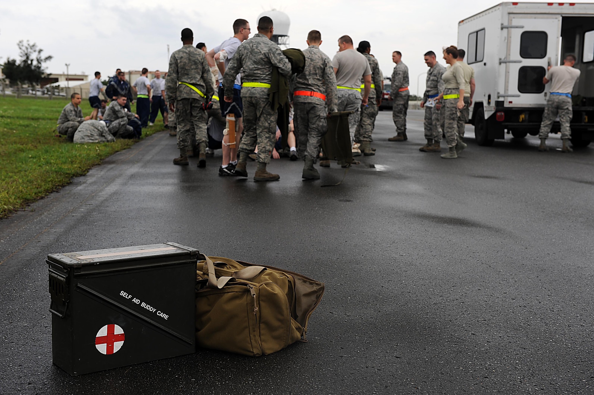 A self-aid and buddy care kit is ready while Airmen transfer victims to a simulated hospital during a training exercise on Kadena Air Base, March 14, 2012. SABC is an important aspect of training for Kadena's Airman because it can be used in military or civilian life. (U.S. Air Force photo by Airman 1st Class Brooke P. Beers/Released)