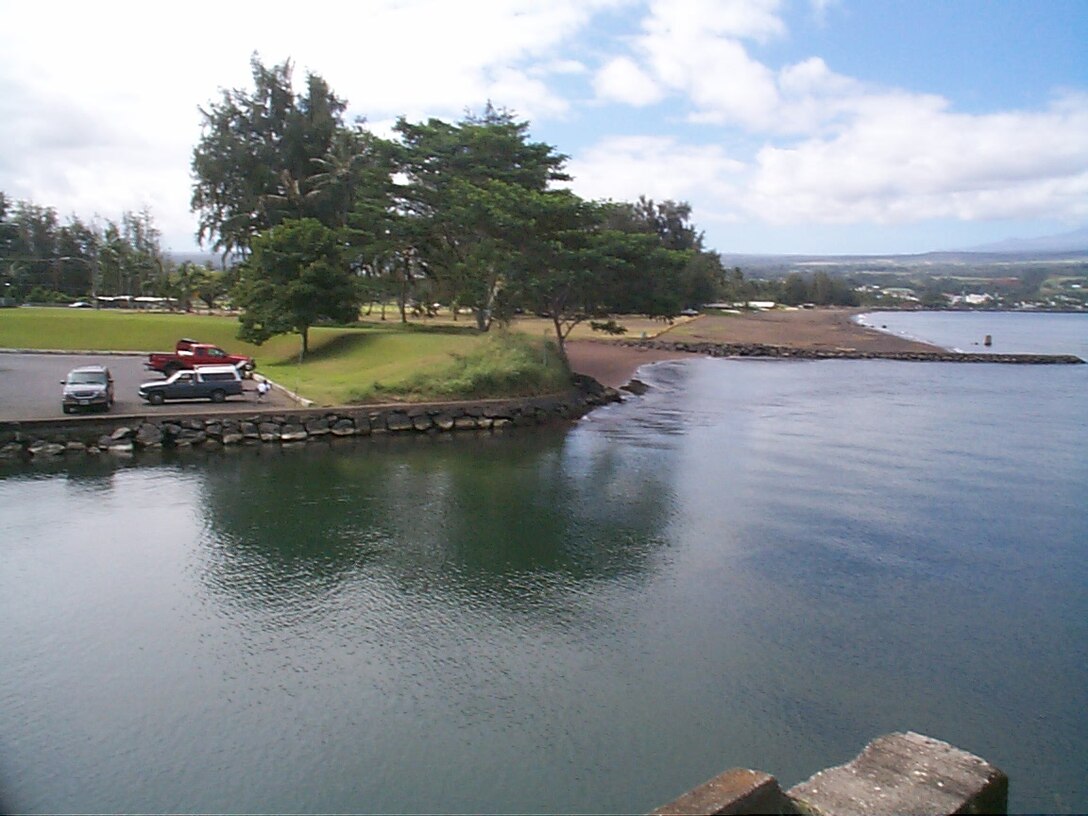 Photograph of the completed flood control project at Wailoa Stream on the island of Hawaii. The project was completed by the Corps in August 1965.