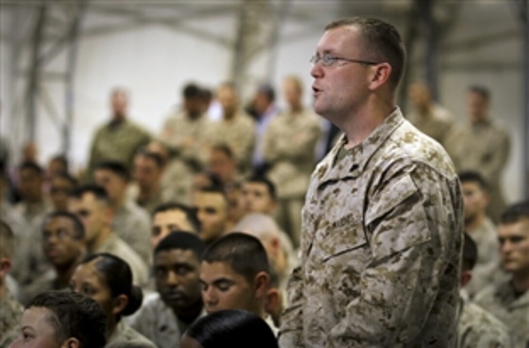 U.S. Marine Corps Sgt. Timothy Guy Jr. asks U.S. Defense Secretary Leon E. Panetta a question about the future of the U.S. military presence overseas during a town hall meeting on Camp Leatherneck, Afghanistan, March 14, 2012. Panetta addressed nearly 200 U.S., Afghan and coalition service members during the visit. Guy, of Tuscaloosa, Ala., is assigned to the 1st Marine Logistics Group (Forward).


