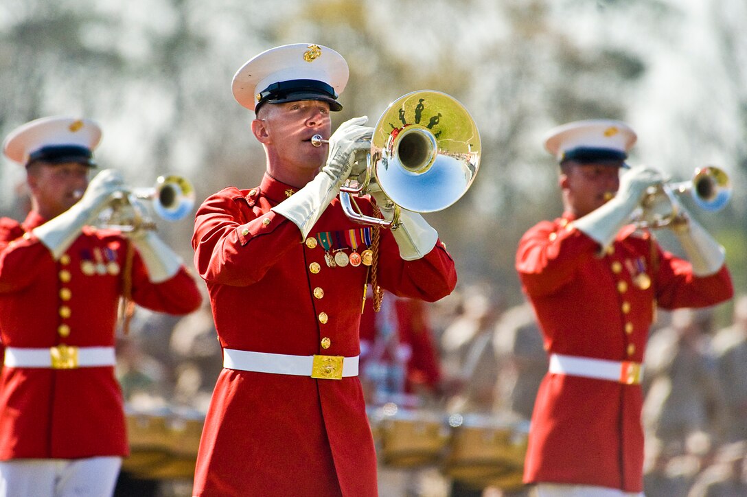 Gunnery Sgt. David Toothman, lower platoon section leader, plays with the Marine Drum & Bugle Corps during a Battle Color Ceremony at Marine Corps Base Camp Lejeune, N.C., March 14, 2012. This was the final performance of Battle Color Detachment's National Installations Tour, which included most of the Corps' stateside installations.