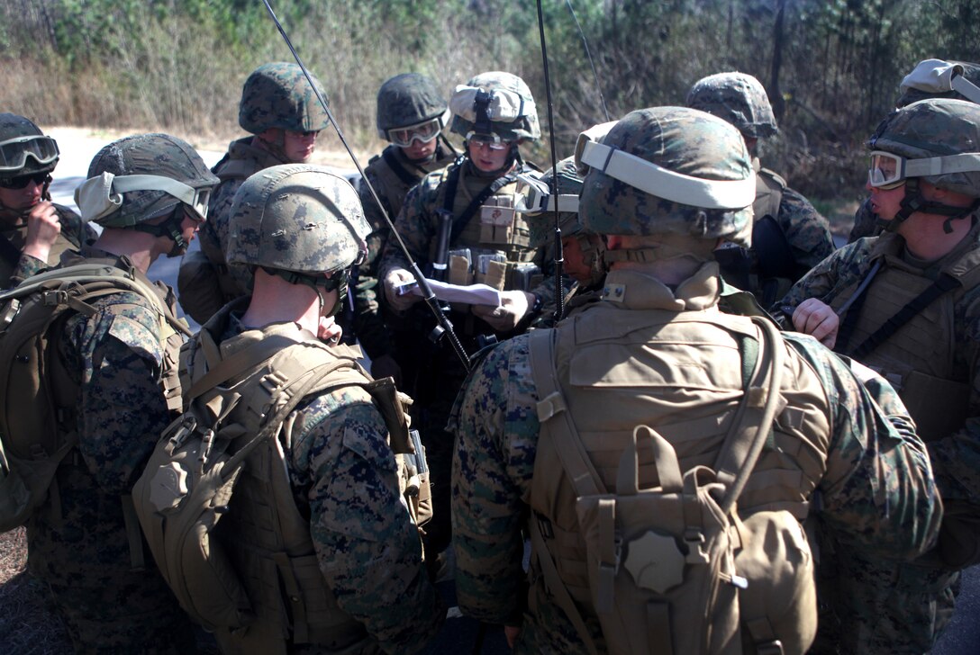 Marines with Production and Analysis Support Company, 2nd Intelligence Battalion, II Marine Expeditionary Force, receive a training brief prior to running the Counter Improvised Explosive Device Lane, March 8. The training provided intelligence analysts with an up close and personnel look at life on the ground while deployed, with the intent of giving the participants a better sense of perspective and understanding while interpreting raw intelligence information during their upcoming deployment.