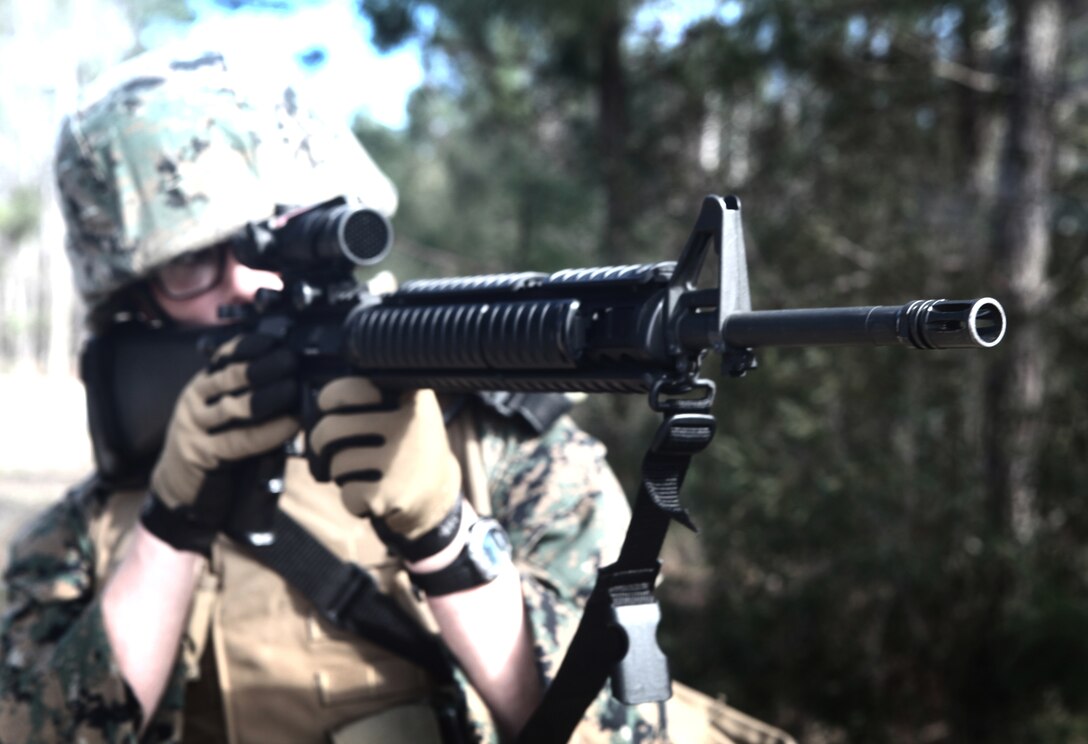 A Marine with Production and Analysis Support Company, 2nd Intelligence Battalion, II Marine Expeditionary Force, provides security during the Counter Improvised Explosive Device Lane, March 8. The training provided intelligence analysts with an up close and personnel look at life on the ground while deployed, with the intent of giving the participants a better sense of perspective and understanding while interpreting raw intelligence information during their upcoming deployment.