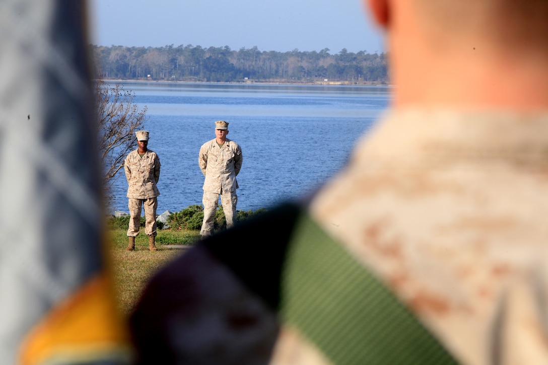 Sergeants Major Lanette N. Wright (left) and Michael W. Redmeyer stand in front of a formation during an appointment and relief ceremony for Combat Logistics Regiment 27, 2nd Marine Logistics Group aboard Camp Lejeune, N.C., March 15, 2012. Wright assumed responsibilities as regimental sergeant major from Redmeyer, who reported in to the 2nd MLG Corporal’s Course following the event.  (U.S. Marine Corps photo by Cpl. Katherine M. Solano)