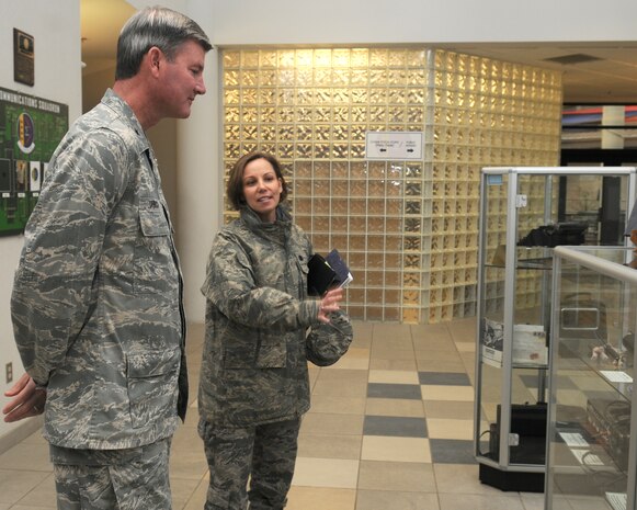Lt. Col. Sue Magaletta, 9th Communication Squadron Commander, guides Brig. Gen. David Urich, Director of Communications, Headquarters Air Combat Command, through the Lt. Gen. Winston D. Powers Museum of Communications & Information Technology at Beale Air Force Base, Calif., March 14, 2012. Equipment from early as the 1930’s are exhibited throughout the museum. (U.S. Air Force photo by Airman 1st Class Samuel W. Sanders/Released)