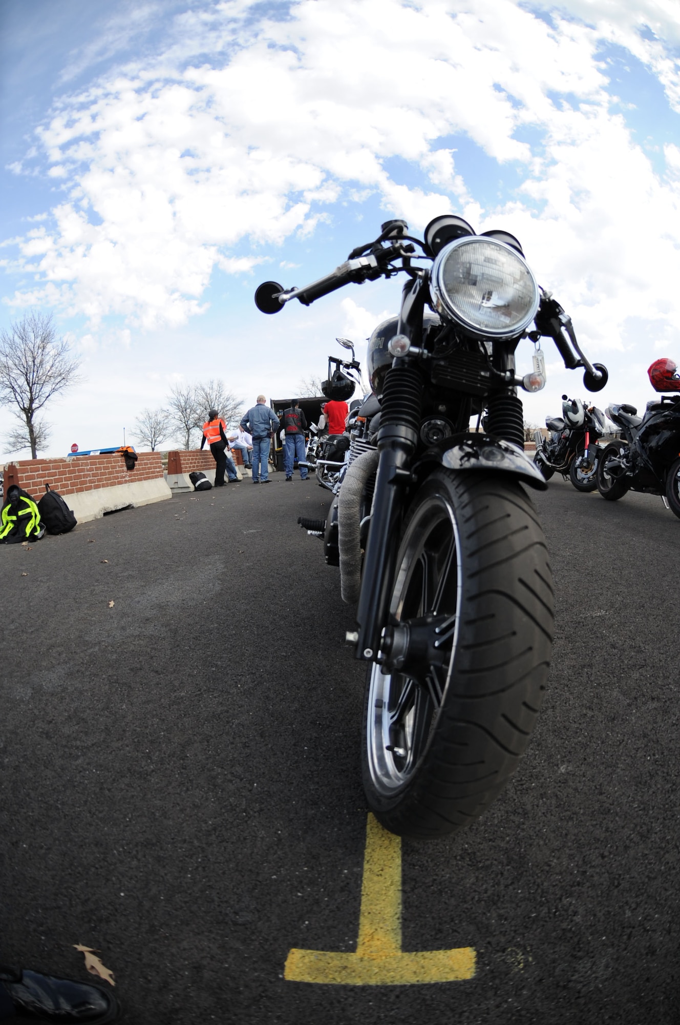 A motorcycle awaits its operator at a motorcycle safety training course at Joint Base Andrews, Md., on March 15, 2012.  The course is required for motorcyclists who ride on base.  To sign up for the course, log on to https://militarysafepmv.com. (U.S. Air Force photo/Senior Airman Torey Griffith)(released)
