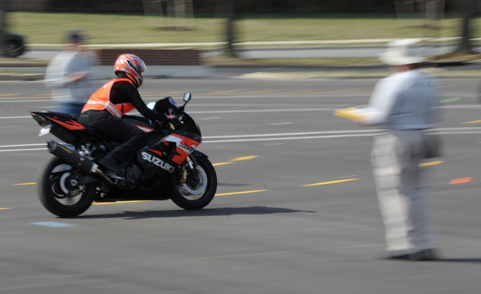 A Team Andrews motorcyclist navigates the road course at a motorcycle safety training course at Joint Base Andrews, Md., on March 15, 2012.  The course is required for motorcyclists who ride on base.  To sign up for the course, log on to https://militarysafepmv.com. (U.S. Air Force photo/Senior Airman Torey Griffith)(released)