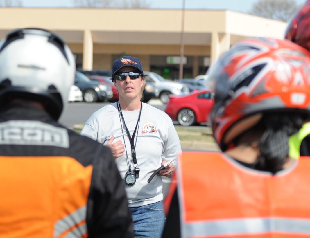 Dina Lavricella, Motorcycle Safety Course instructor, briefs participants at a motorcycle safety training course at Joint Base Andrews, Md., on March 15, 2012.  The course is required for motorcyclists who ride on base.  To sign up for the course, log on to https://militarysafepmv.com.  (U.S. Air Force photo/Senior Airman Torey Griffith)(released)