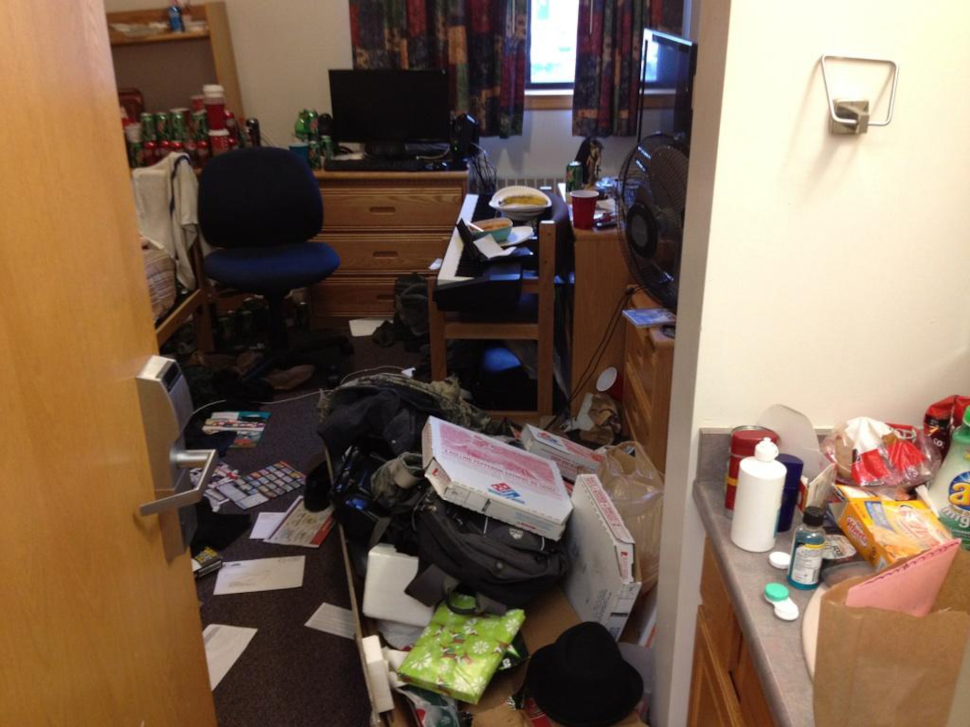Pictured above is an example of how a dorm should not look. Dorms should be kept clean and orderly as much as possible on a day-to-day basis. Keeping rooms clean can prevent damage to furniture and injury.  (U.S. Air Force courtesy photo)
