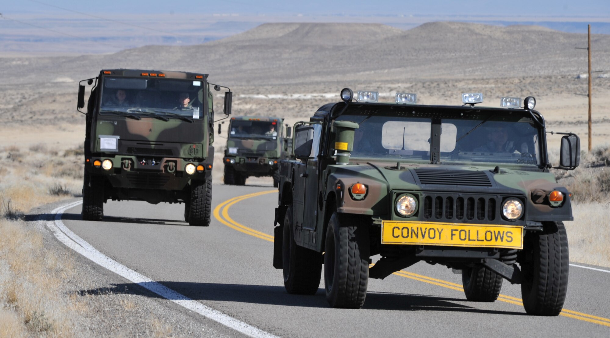A convoy driven by members of the 726th Air Control Squadron simulates ground personnel during exercise Mountain Roundup at Mountain Home Air Force Base, Idaho, March 9, 2012. More than 300 sorties will be conducted during the course of this two-week exercise, providing flight crews an invaluable training experience which would not have the same real-world impact without the dedicated contributions of the Airmen of the 726th. (U.S. Air Force photo/Airman 1st Class Heather Hayward)