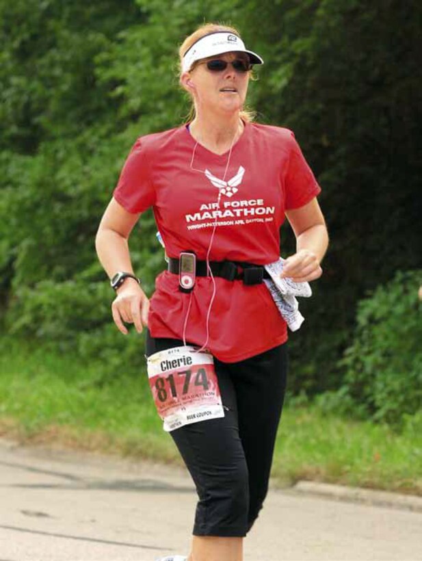 Lt. Col. Cherie Roff, 916th Logistics Readiness Squadron commander, Seymour Johnson AFB, N.C., was one of several Airmen to run in the Air Force Marathon last year using earbuds. The course was closed to traffic, therefore, safety was not an issue. (U.S. Air Force courtesy photo)