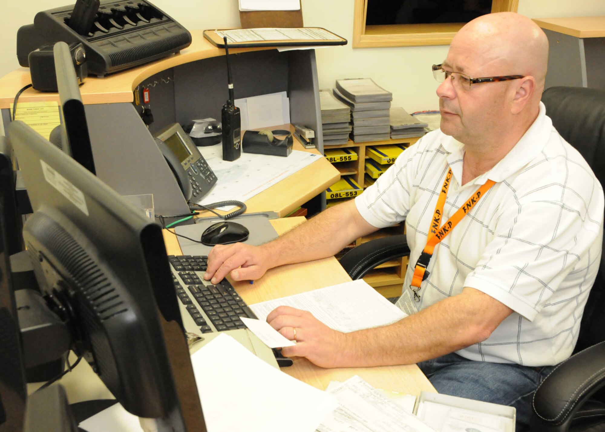 Helio Ramos, 65th Logistics Readiness Squadron fuels controller, inputs fuel data in the computer, March 13, 2012. Fuel controllers account for more than 35 million gallons of fuel worth $134 million, which is the largest fuel supply in the United States Air Forces in Europe and the second largest in the Air Force. (U.S. Air Force photo/Tech. Sgt. Chyrece Campbell)