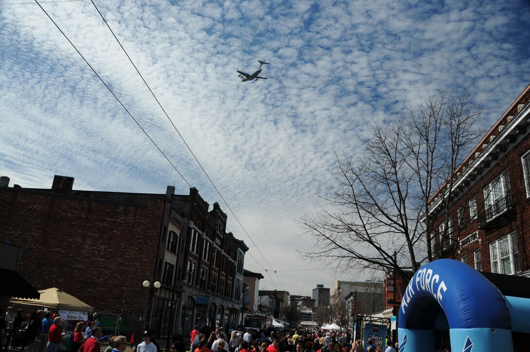 WRIGHT-PATTERSON AIR FORCE BASE, Ohio - A 445th Airlift Wing C-17 Globemaster III flies over downtown Dayton’s Oregon District during the First Four Festival March 11, 2012. (U.S. Air Force photo/Tech. Sgt. Anthony Springer)