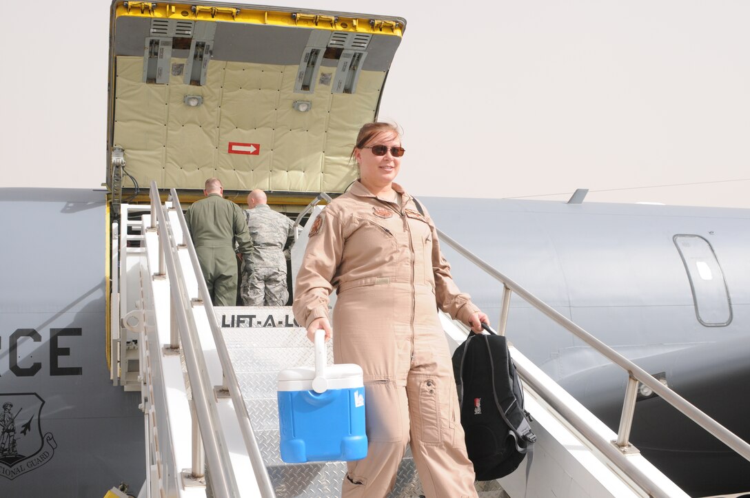 Capt. Tamela Demik, 161st Operations Group, chief of current operations, returns from a deployment in support of Operation Iraqi Freedom and Operation Enduring Freedom, Nov. 4, 2011. Captain Demik was assigned to the 340th Expeditionary Air Refueling Squadron in Southwest Asia. (U.S. Air Force photo/Master Sgt. Charles Wade/Released)