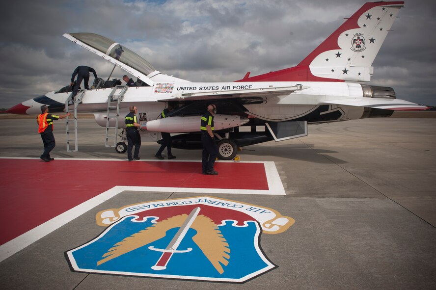 U.S. Air Force Capt. Michael Fisher, Thunderbird 8 advanced pilot and narrator exits an F-16C/D Fighting Falcon during his site survey at Moody Air Force Base. Ga., Feb. 16, 2012. Fisher spent two days at Moody for familiarization of the people and the airfield where he will be working during the the Legacy of Liberty 2012 airshow, Oct. 27 and 28. (U.S. Air Force photo by Airman 1st Class Nicholas Benroth/Released)