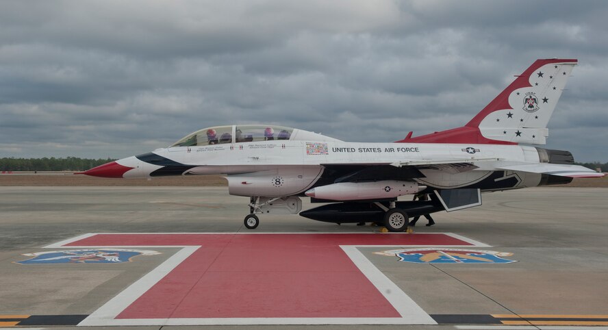 U.S. Air Force Capt. Michael Fisher, Thunderbird 8 advanced pilot and narrator, and Staff Sgt. Raymond LeBlanc, flying crew chief lands at Moody Air Force Base. Ga., Feb. 16, 2012. The trip consisted of a meeting with maintenance members and the Legacy of Liberty 2012 airshow committee members in preparation for the arrival of the Thunderbirds demonstration team. (U.S. Air Force photo by Airman 1st Class Nicholas Benroth/Released)