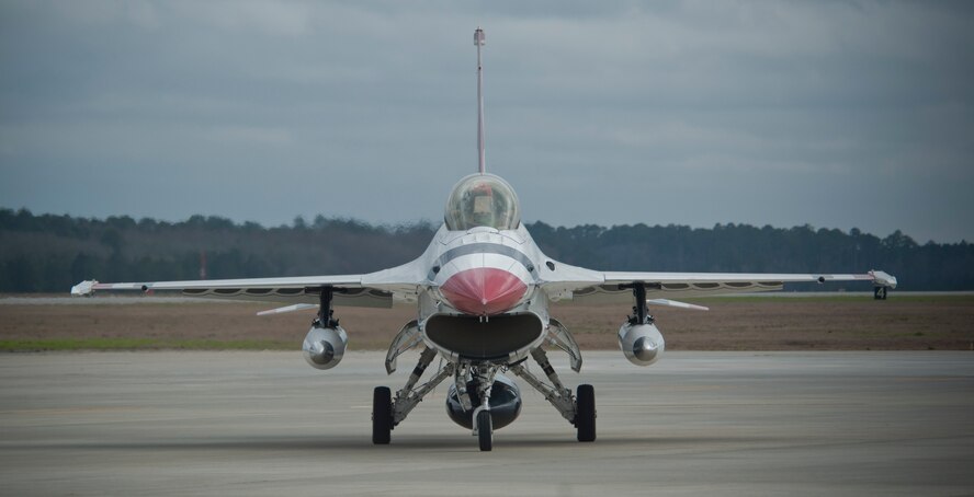 An F-16C/D Fighting Falcon with the U.S. Air Force Thunderbirds team taxis down the runway during a sight survey at Moody Air Force Base. Ga., Feb. 16, 2012. The visit was part of a site survey for their upcoming performance at the Legacy of Liberty 2012 airshow, Oct. 27 and 28. (U.S. Air Force photo by Airman 1st Class Nicholas Benroth/Released)