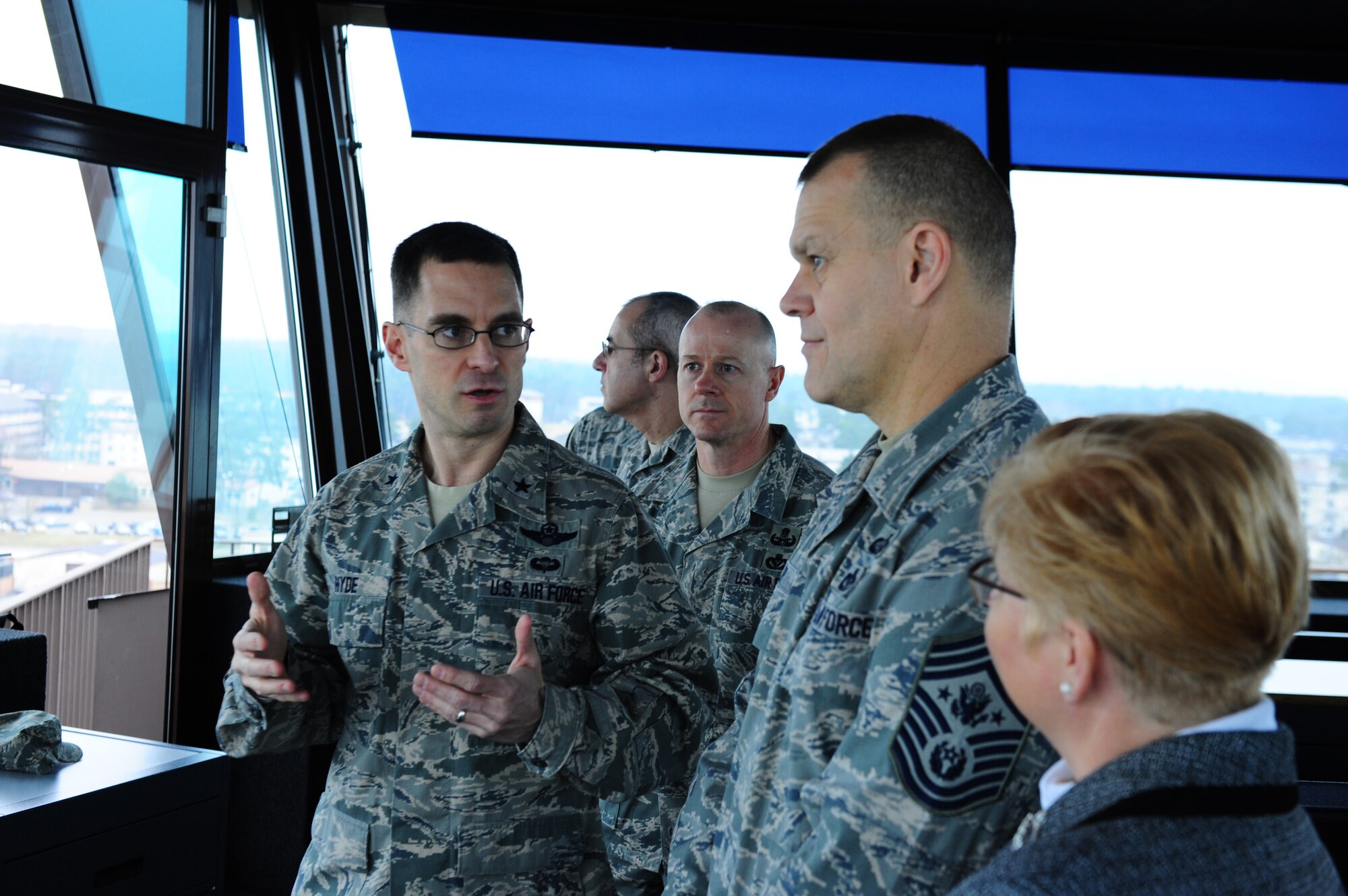 Air Force Brig. Gen. C.K. Hyde briefs Chief Master Sgt. of the Air Force James Roy and Mrs. Paula Roy on installation operations at Ramstein Air Base, Germany, March 14, 2012. Chief Master Sgt. of the Air Force Roy  and Mrs. Roy visited several units at Ramstein and Landstuhl. (U.S. Air Force photo/Amn Brea Miller)