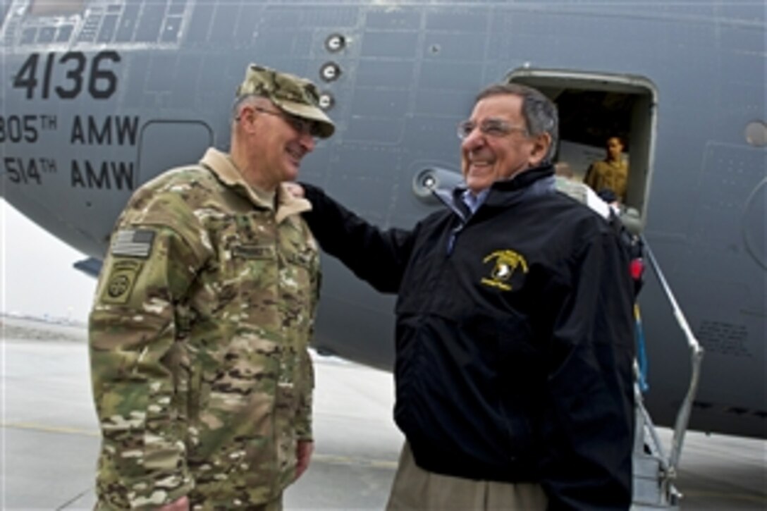 U.S. Defense Secretary Leon E. Panetta greets U.S. Army Lt. Gen. Curtis M. Scaparrotti, commander of the International Security Assistance Force Joint Command, upon arriving on Bagram Air Base, Afghanistan, March 14, 2012.