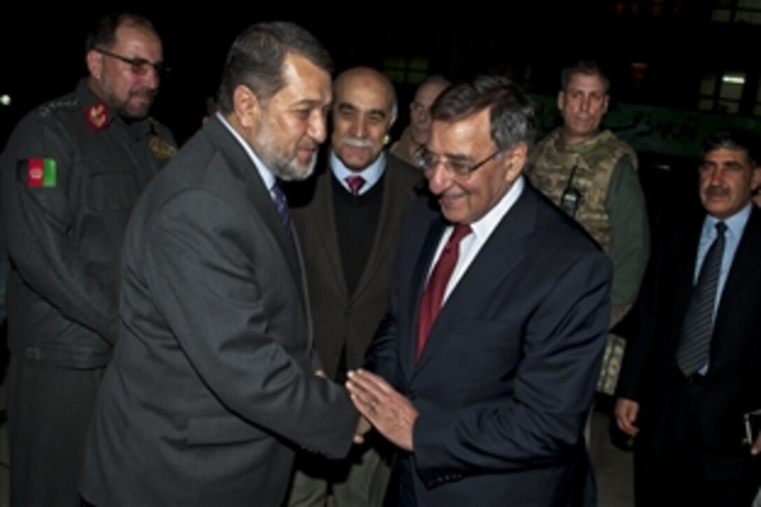 U.S. Defense Secretary Leon E. Panetta talks with Afghan Interior Minister Bismullah Muhammadi Khan in Kabul, Afghanistan, March 14, 2012.