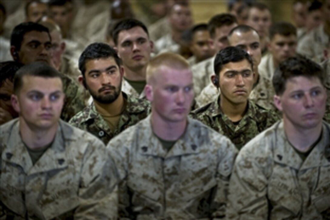 U.S. Marines and Afghan soldiers attend an all-hands call with U.S. Defense Secretary Leon E. Panetta on Camp Leatherneck, Afghanistan, March 14, 2012. Panetta is on a four-day trip to the region to meet with counterparts, leaders and service members.