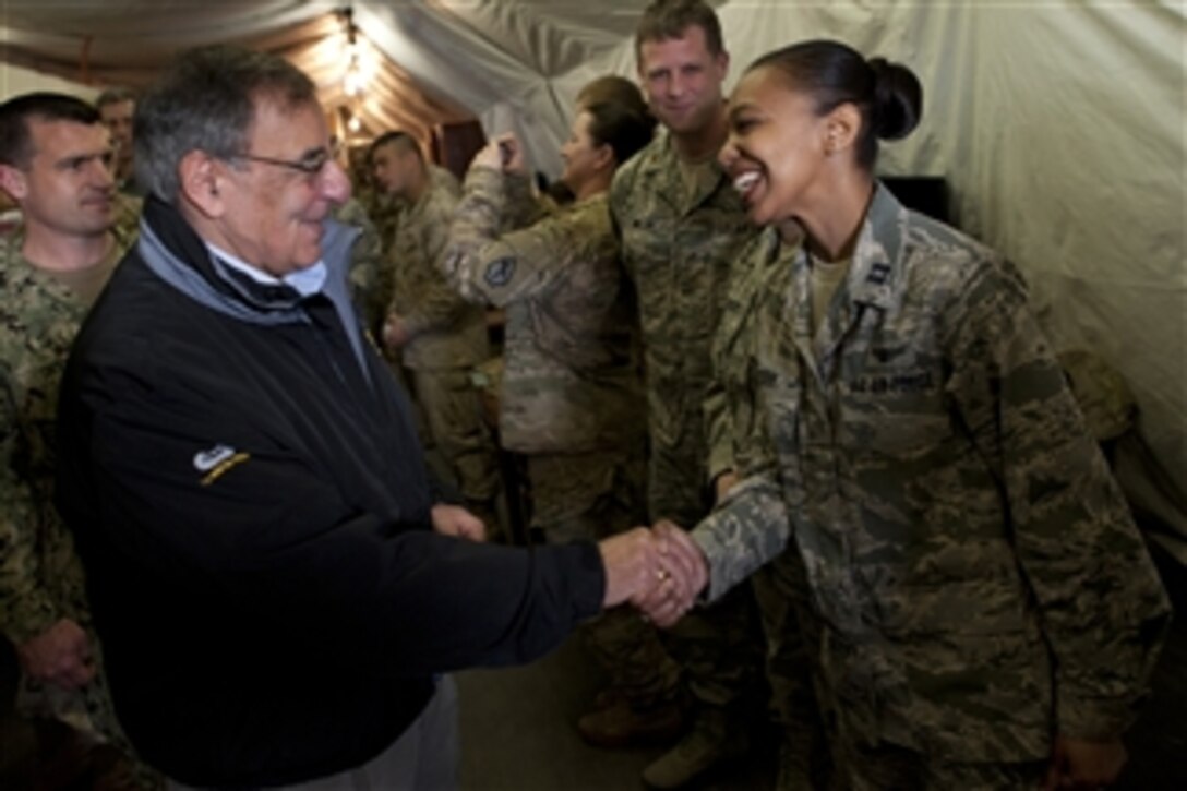 Secretary of Defense Leon E. Panetta greets service members transiting into or out of Afghanistan at the Manas Air Base Transit Center, Kyrgyzstan, on March 14, 2012.  Panetta met with counterparts and troops during his visit in the country.  