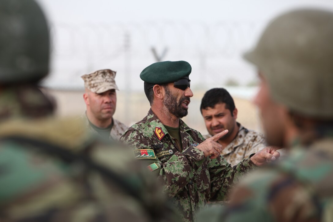 Col. Mumtaz Karimi, the Regional Logistics Support Command-Southwest commander, speaks to his soldiers before they depart for their first independent, cross-boundary combat logistics patrol at Camp Shorabak, March 15. “His confidence is growing every day,” said Lt. Col. Luke Kratky, partnering officer-in-charge of Regional Logistics Support Command-Southwest Advisor Team. “He now stands tall when he speaks to his soldiers and is able to inspire them.