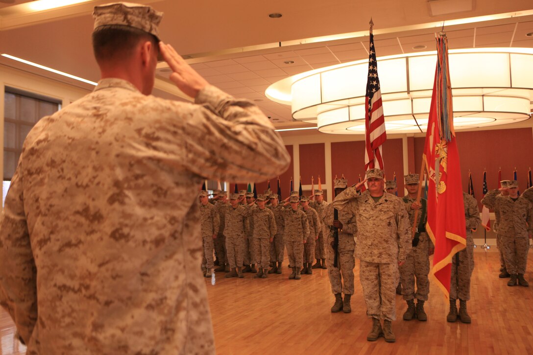 Sgt. Maj. Herbert Wayne Wrench, the sergeant major of 2nd Marine Logistics Group, salutes Col. Mark Hollahan, the commanding officer, during his retirement ceremony aboard Camp Lejeune, N.C., March 16, 2012.  During the ceremony, Hollahan spoke of Wrench’s love of motorcycles, devotion to friends and family, and unwavering dedication to upholding the Marine Corps standard in everything he did.  (U.S. Marine Corps photo by Cpl. Katherine M. Solano)