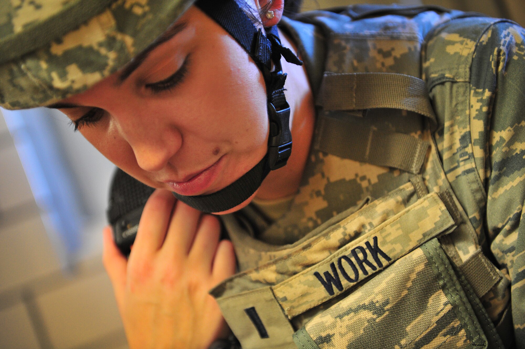 U.S. Air Force 1st Lt. Mary Work, 27th Special Operations Security Forces Squadron, communicates with her team during an active shooter training scenario at Cannon Air Force Base, N.M., March 1, 2012. Training scenarios provide a safe and controlled environment to practice different tactics, techniques and procedures. (U.S. Air Force photo by Tech. Sgt. Josef Cole)