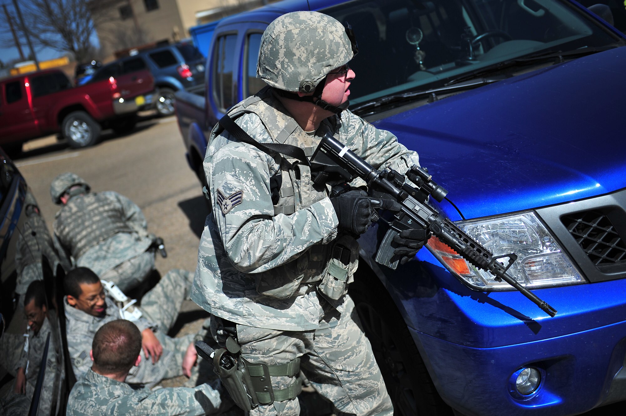 A U.S. Air Force Airman from the 27th Special Operations Security Forces Squadron, provides security during an active shooter training scenario at Cannon Air Force Base, N.M., March 1, 2012. Training scenarios provide a safe and controlled environment to practice different tactics, techniques and procedures. (U.S. Air Force photo by Tech. Sgt. Josef Cole)