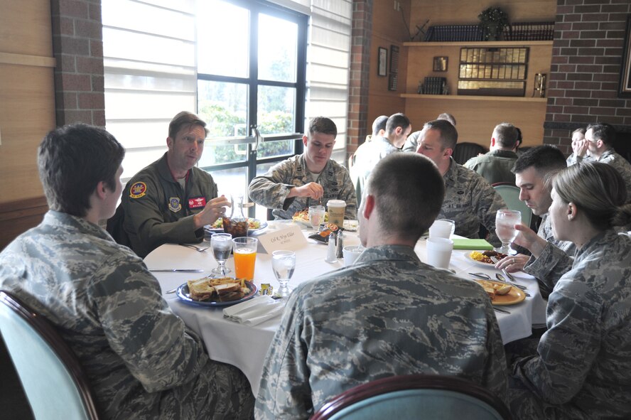 Col. Wyn Elder, 62nd Airlift Wing commander, speaks about developing leadership to members of the McChord Field Company Grade Officer Council during a mentoring session March 16, 2012, at Joint Base Lewis-McChord, Wash. (U.S. Air Force photo/Staff Sgt. Frances Kriss)