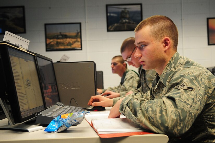 Airmen with the U.S. Air Force 362nd Training Squadron, 1st Detachment, take their written exam at the U.S. Army Aviation Logistics School, Feb. 7, 2012. Instructors at the schoolhouse have 71 training days to prepare Soldiers and Airmen for the rigorous demands of the flight line. (U.S. Air Force photo by Staff Sgt. Ashley Hawkins/Released)