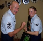 The love of the military runs deep for Senior Master Sgt. James Smith and his daughter Senior Airman Erin Smith who are both 302nd Airlift Wing members. “I grew up in a military family so the military part was always imbedded into everything I did growing up, even to the point of doing pushups when I wrote on my hand,” said Senior Airman Smith. (Courtesy photo) 