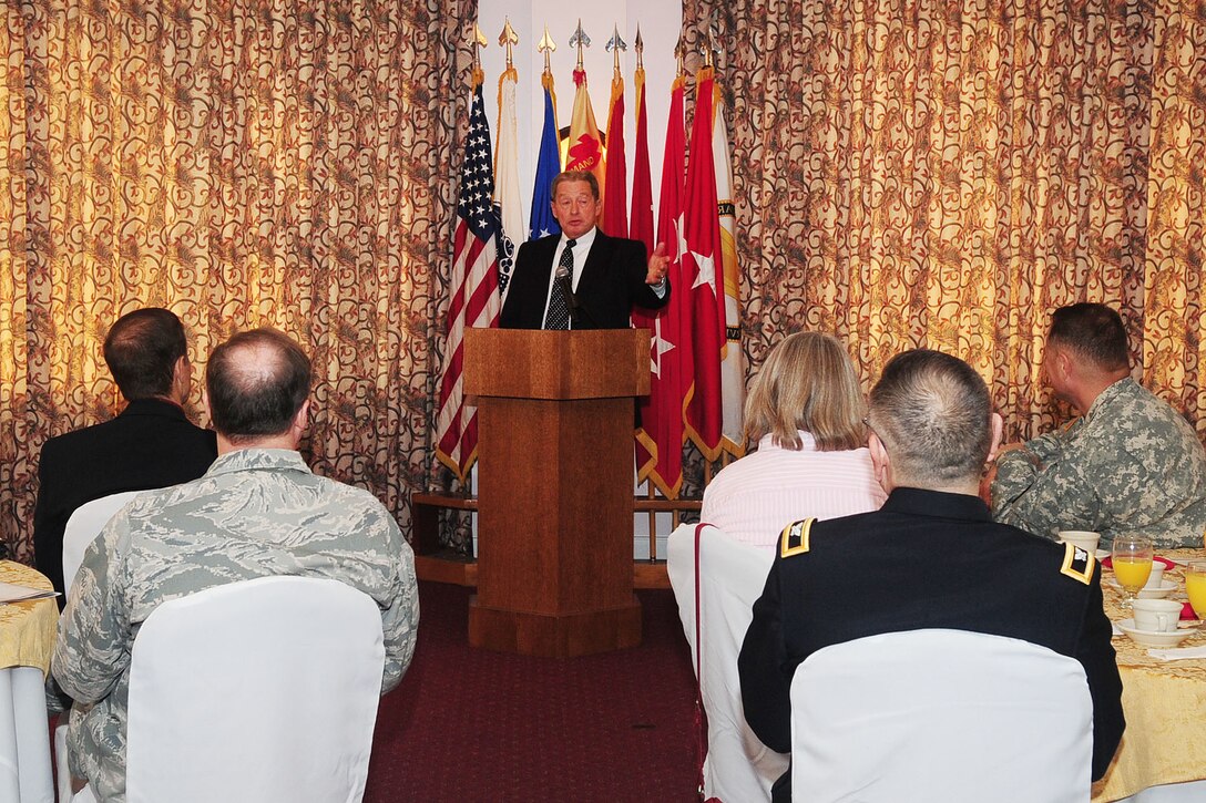 Retired U.S. Army Col. (Chap.) David P. Peterson speaks to Joint Base Langley-Eustis personnel during the National Prayer Breakfast at Fort Eustis, Va., March 15, 2012. Peterson presented in his speech a reminder to us all about what it means to live freely and have rights in America. (U.S. Air Force photo by Staff Sgt. Ashley Hawkins/Released)