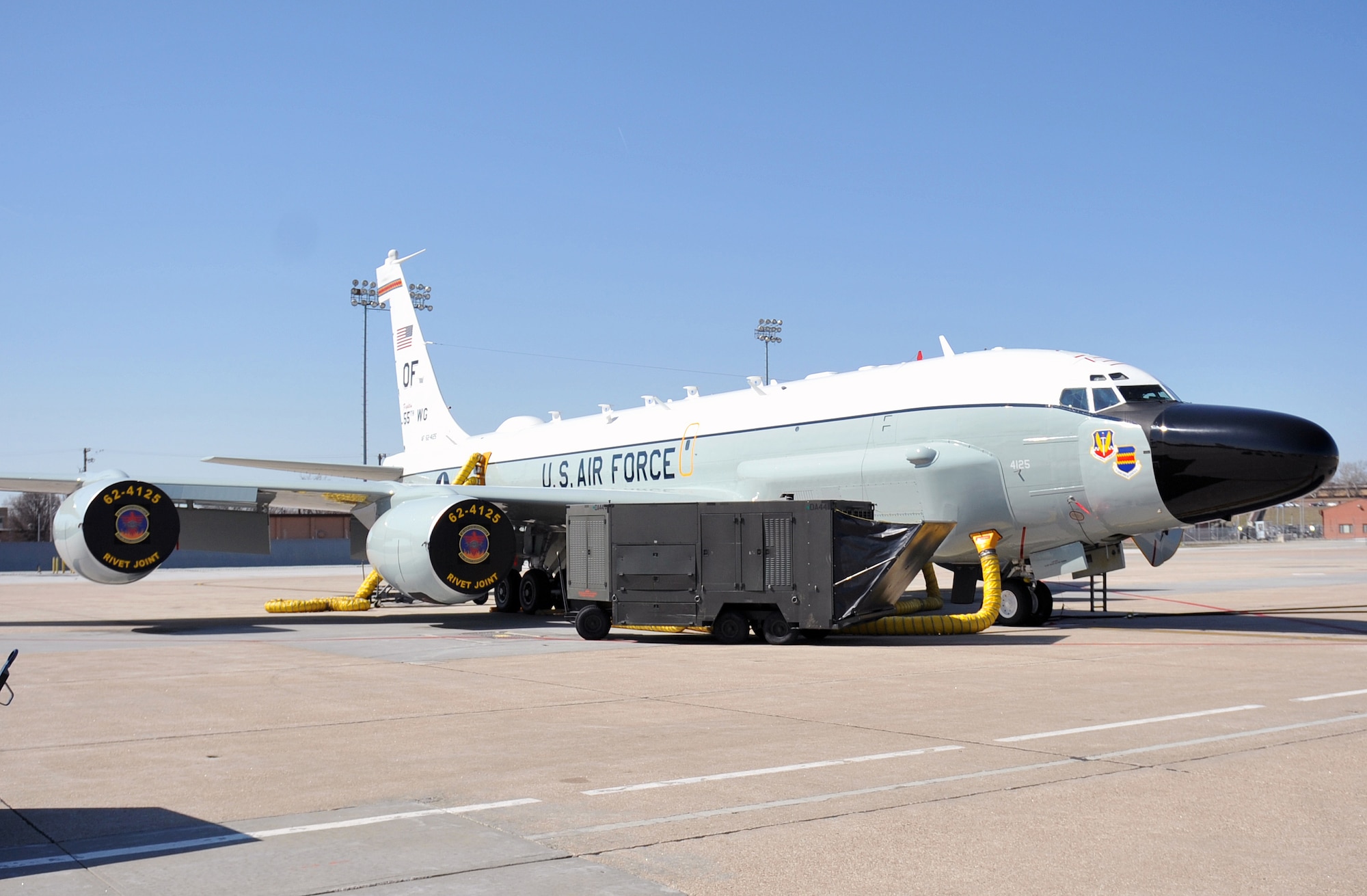 An RC-135V/W Rivet Joint sits on display outside the Bennie Davis Maintenance Facility as the new flagship aircraft of the 55th Wing at Offutt Air Force Base, Neb., March 16. The jet recently returned from being upgraded and was freshly painted with the new wing designator. The flagship aircraft stands as a symbol for every member of the 55th WG. (Photo by Jeff Gates/Released)