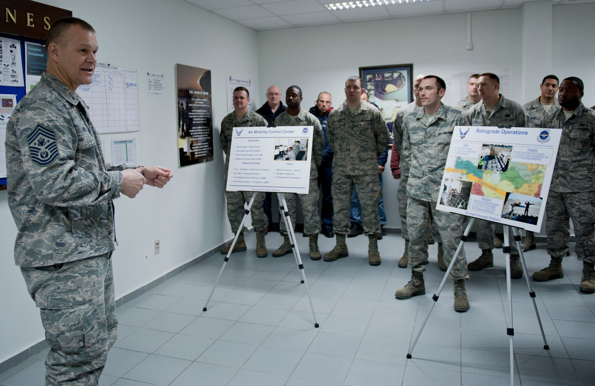 Chief Master Sgt. of the Air Force James Roy, left, discusses training importance with 39th Maintenance Squadron Airmen March 16, 2012, at Incirlik Air Base, Turkey. Roy articulated the importance of conducting training, especially for first-term Airmen. (U.S. Air Force photo by Senior Airman Anthony Sanchelli/Released)